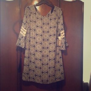 A Must have dress!! Mid thigh just above the knee!